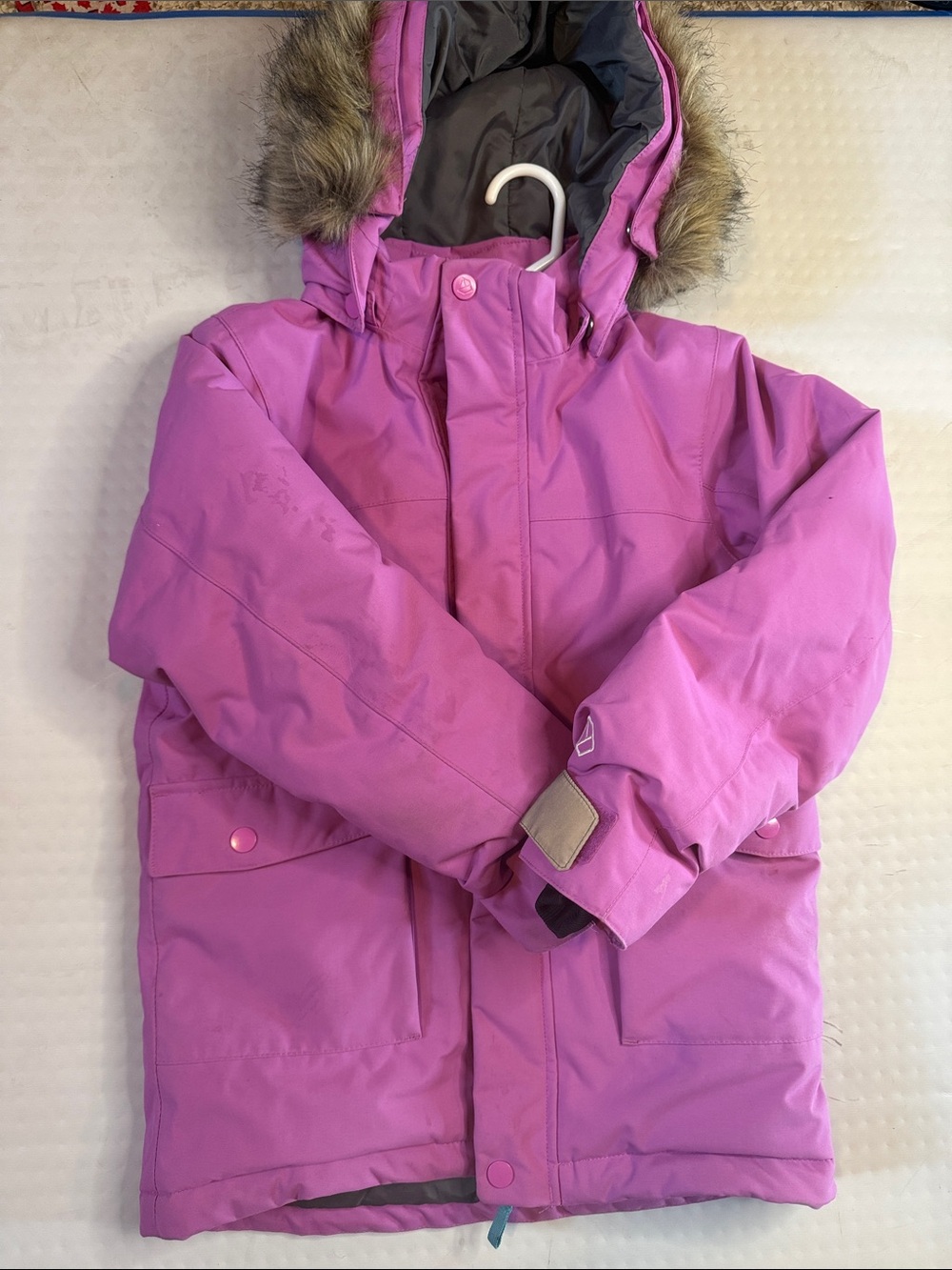 Kids Pink Hooded Winter Jacket with Faux Fur Trim with matching snowpants.